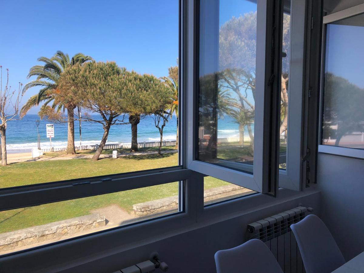 Apartamento Comillas Beach Bagian luar foto