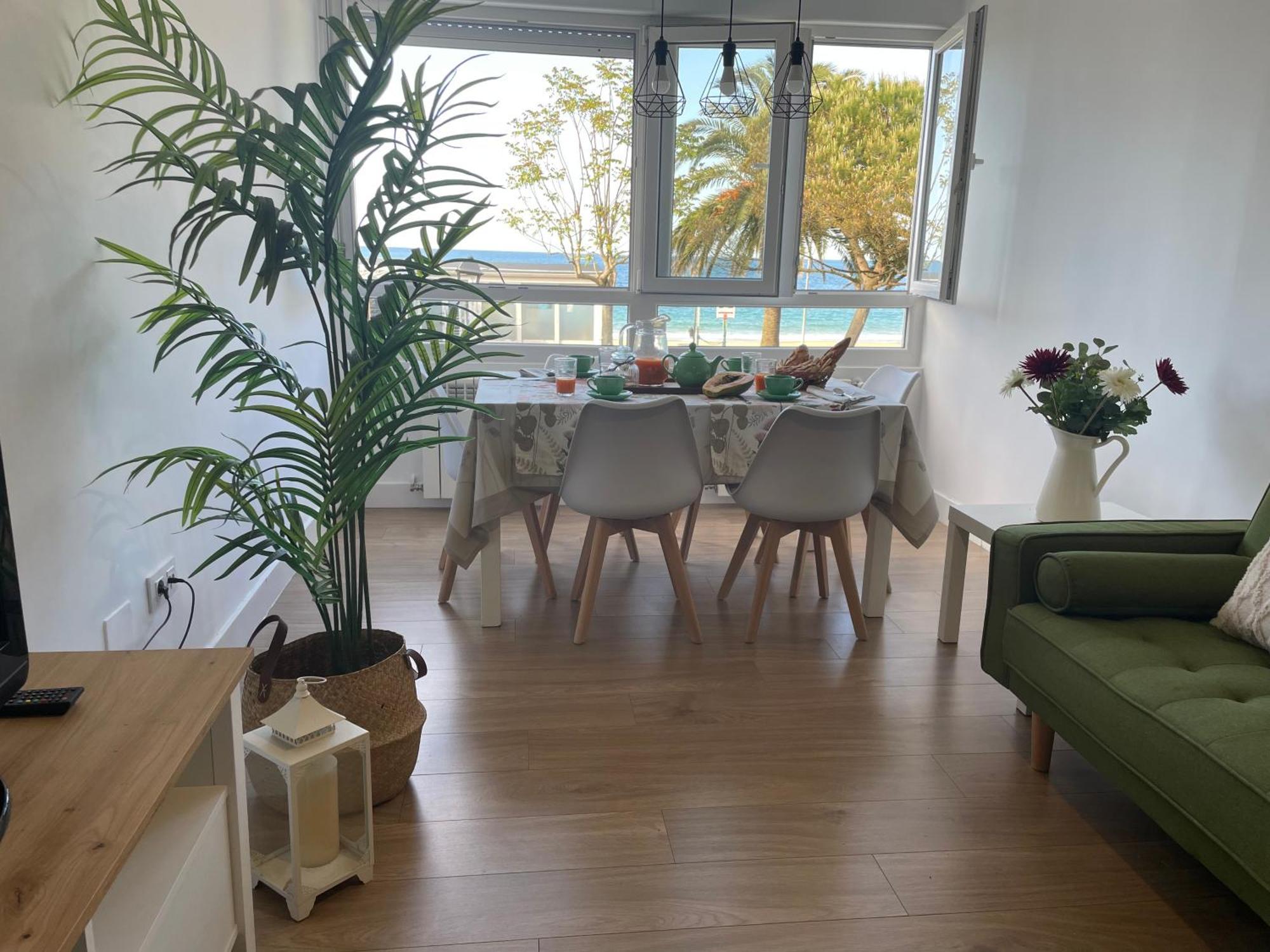 Apartamento Comillas Beach Bagian luar foto
