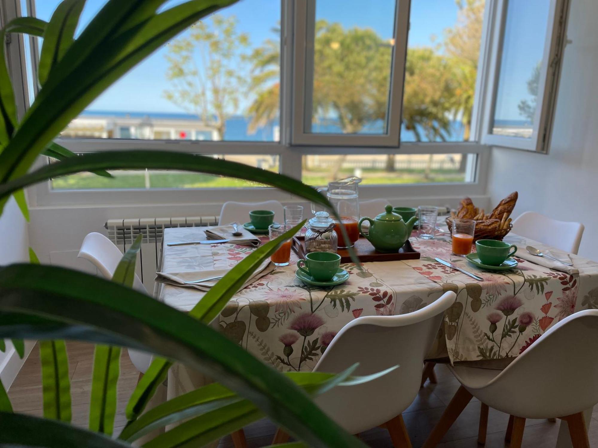 Apartamento Comillas Beach Bagian luar foto