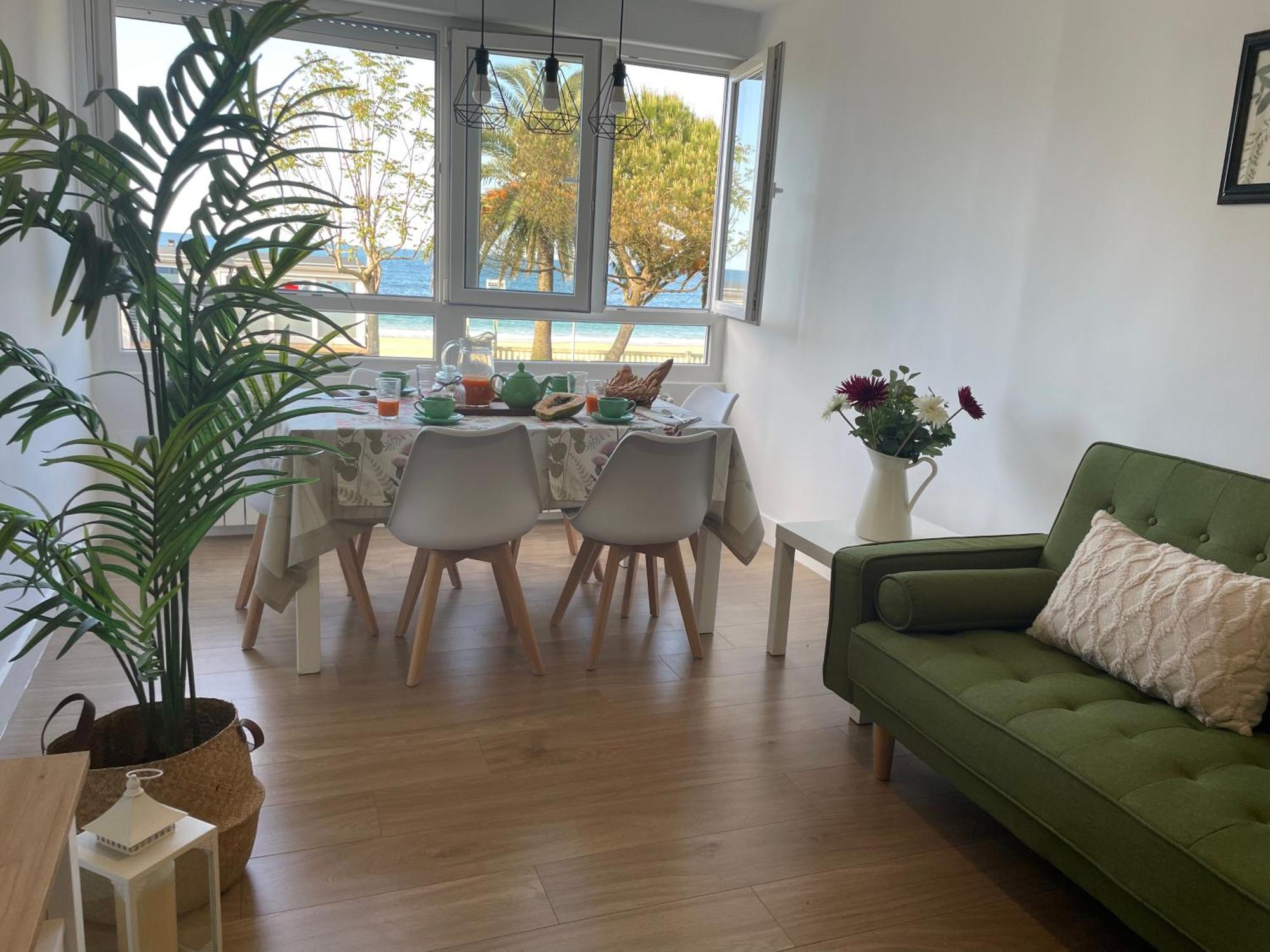 Apartamento Comillas Beach Bagian luar foto