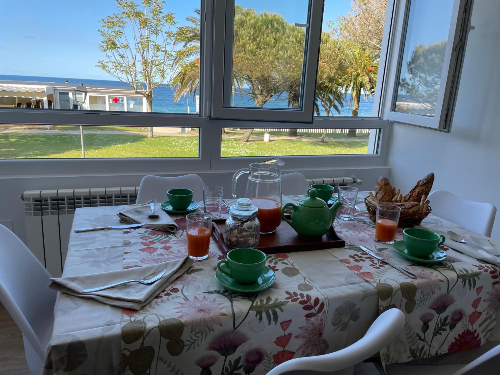 Apartamento Comillas Beach Bagian luar foto
